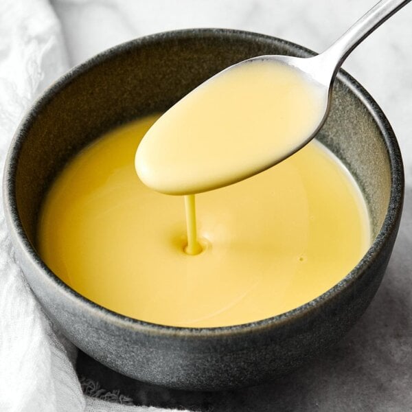 A spoonful of beurre blanc sauce.