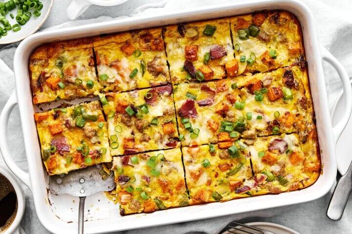 A white baking dish with the best breakfast casserole.