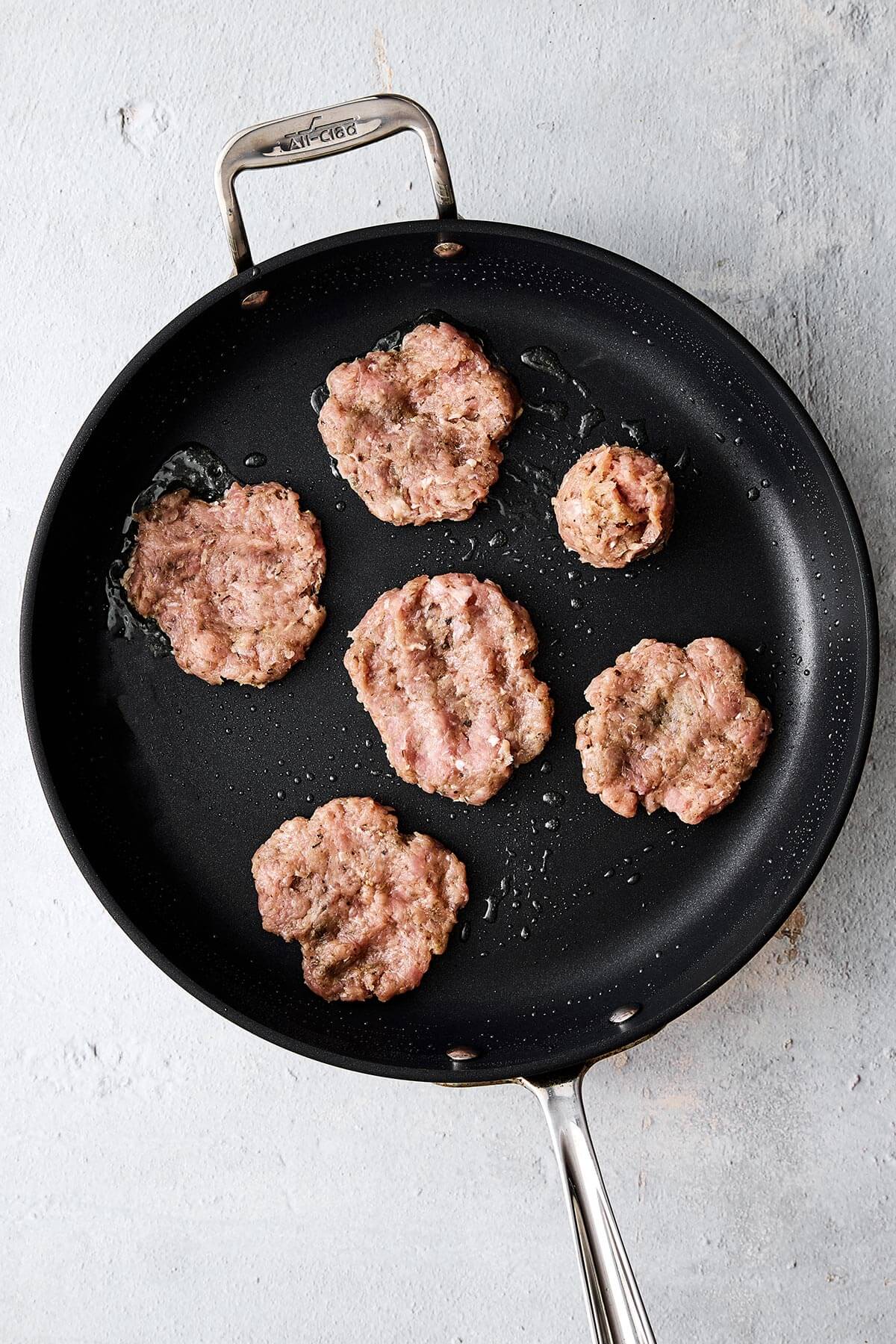 Cooking chicken breakfast sausage patties.