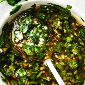 A spoonful of chimichurri sauce