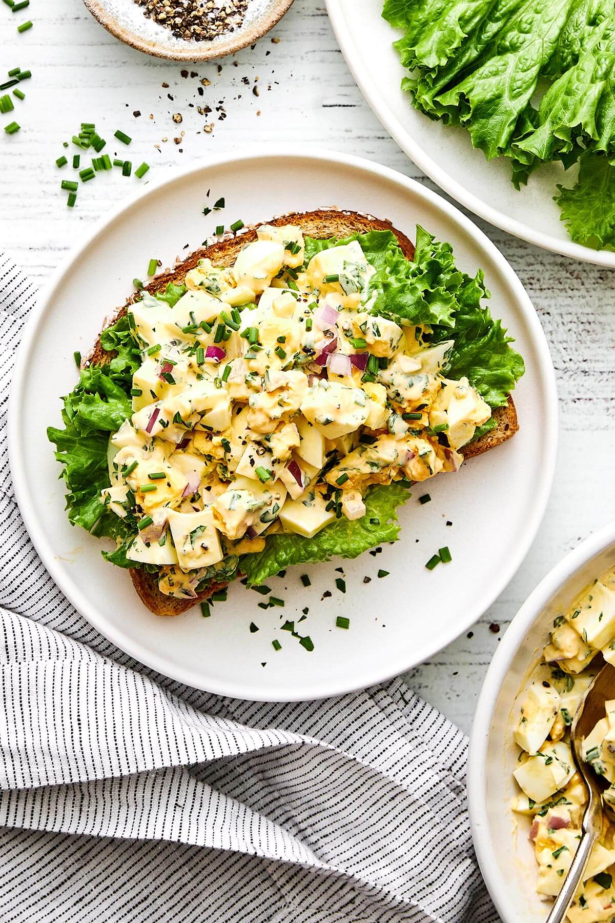 Egg salad on top of bread.