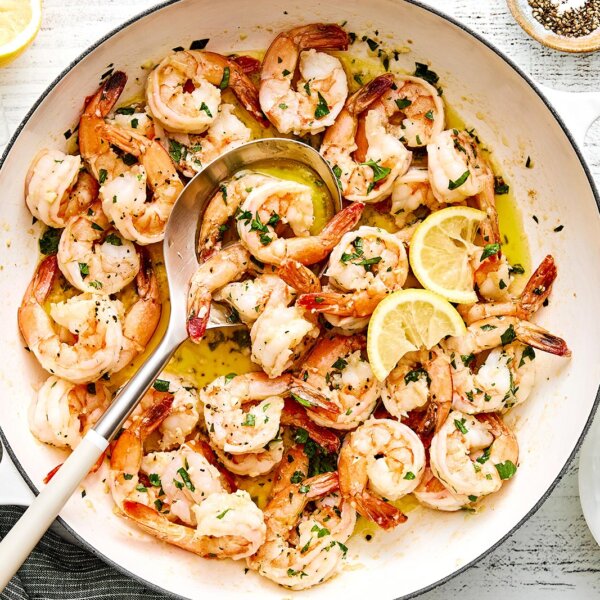 A white pan of garlic butter shrimp.