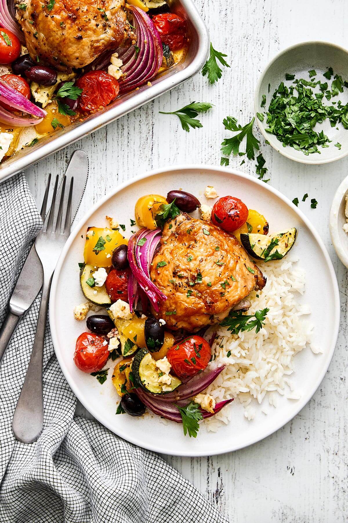 Greek chicken with rice and vegetables.