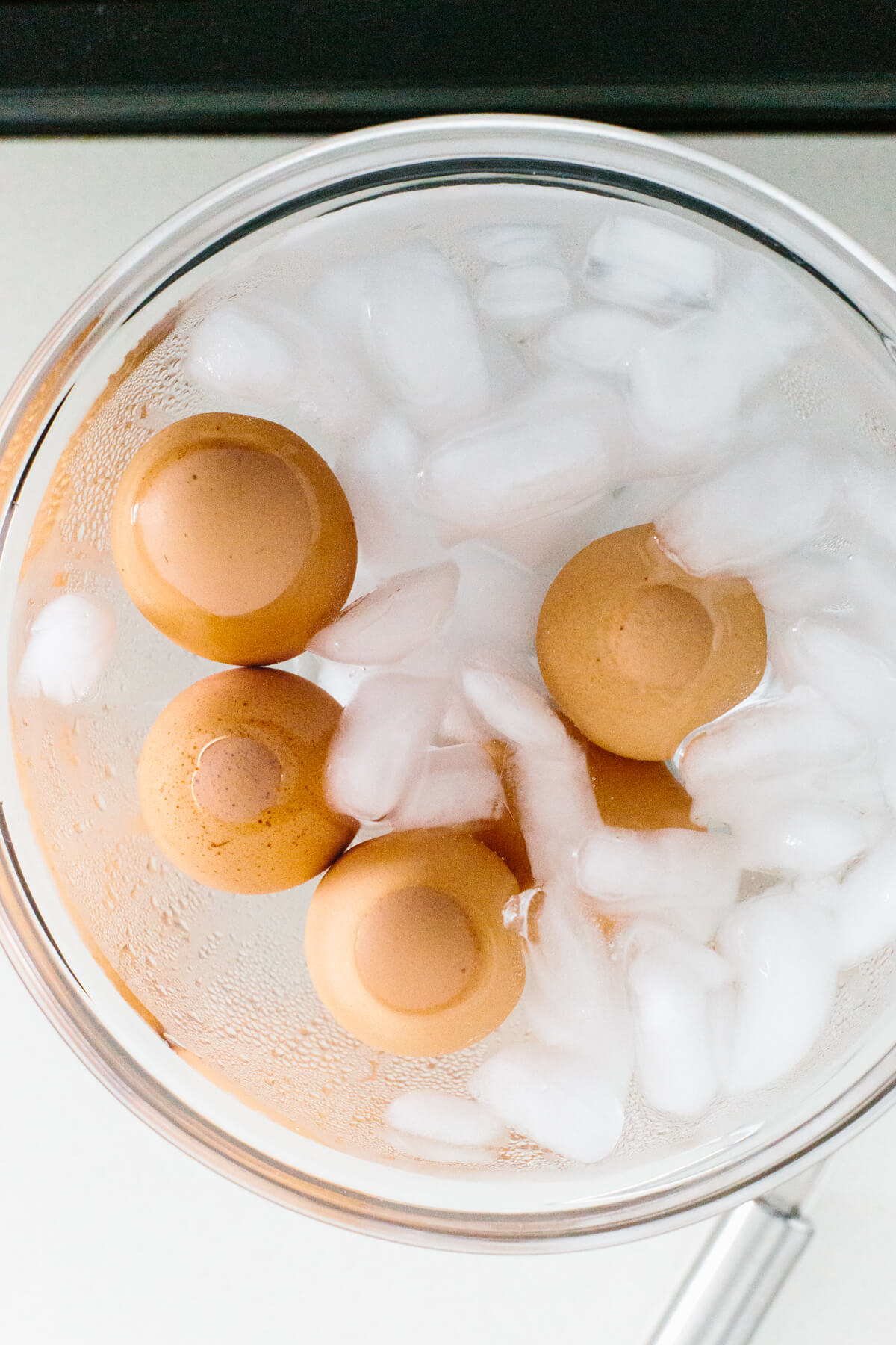 Learn how to make hard boiled eggs so that they're perfect and easy to peel! Hard boiled eggs in an ice water bath.