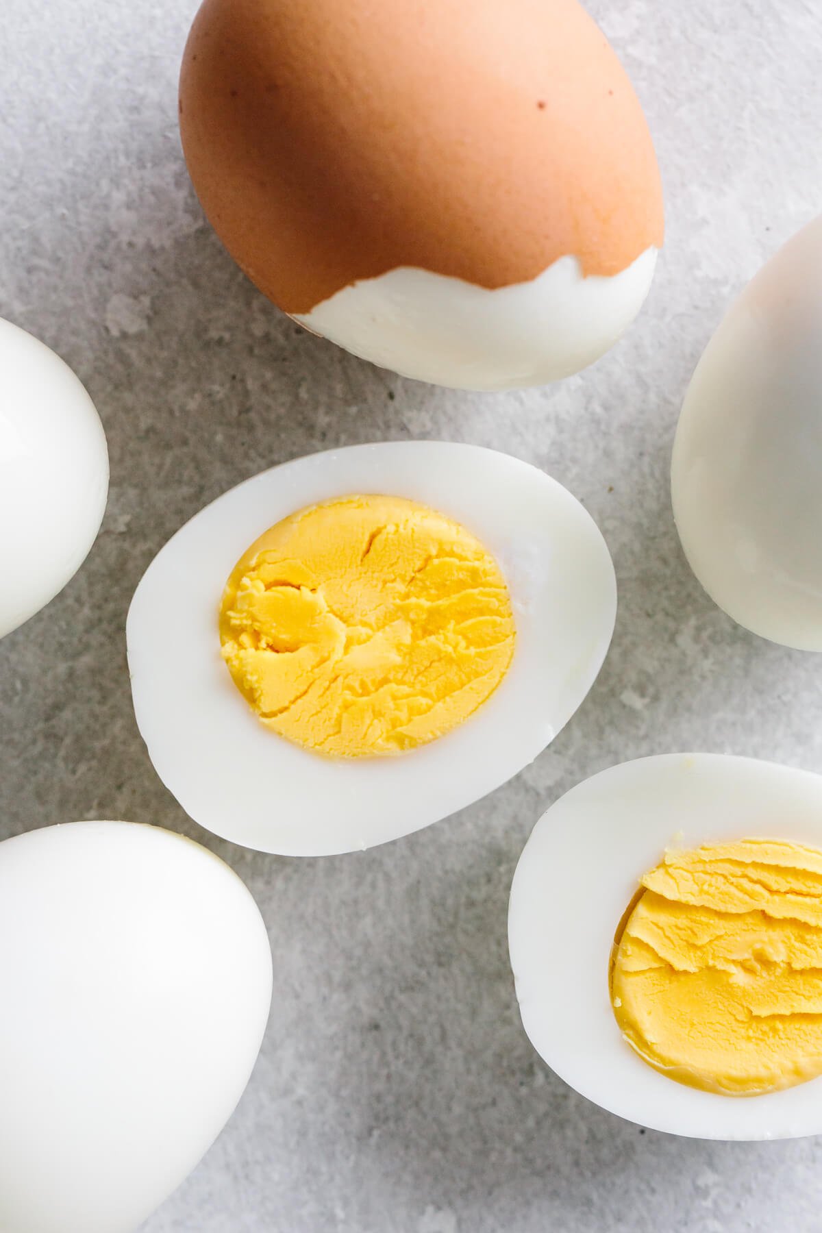 Learn how to make hard boiled eggs so that they're perfect and easy to peel! Hard boiled eggs on the counter.