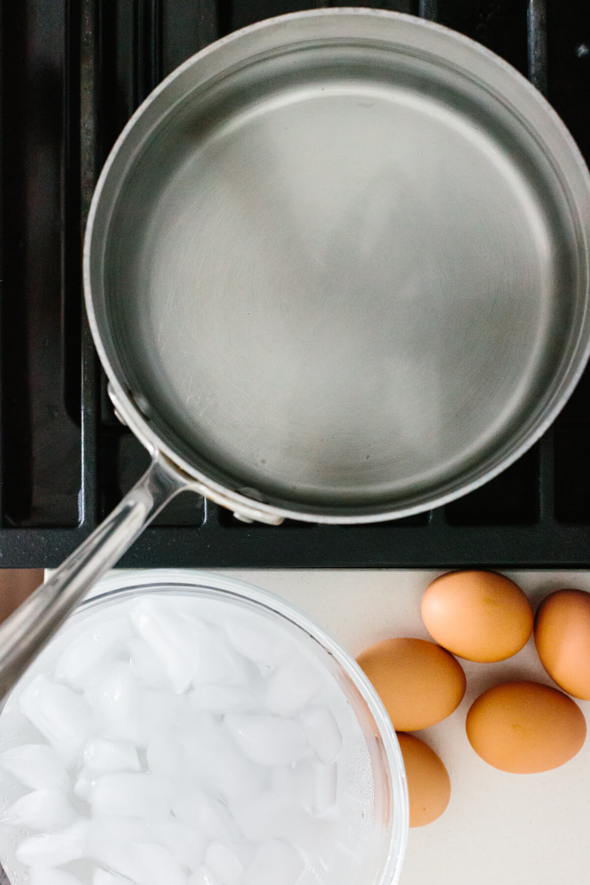 Learn how to make hard boiled eggs so that they're perfect and easy to peel! A pot of hot water on the stove and an ice water bath.