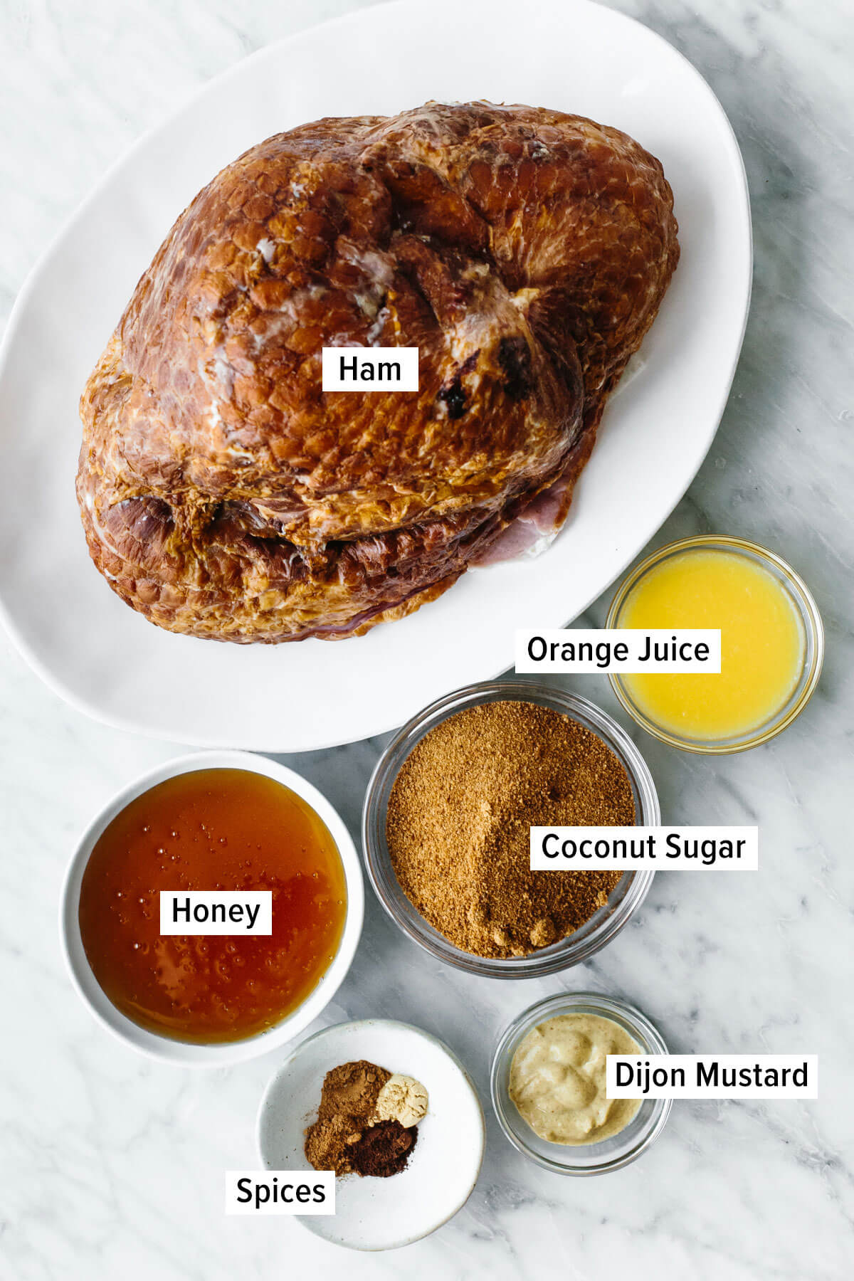 Ingredients for honey baked ham on a table