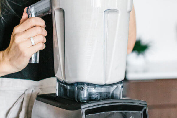 Homemade almond milk in a blender
