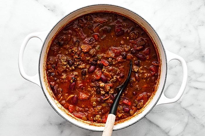 Simmering chili in a pot.
