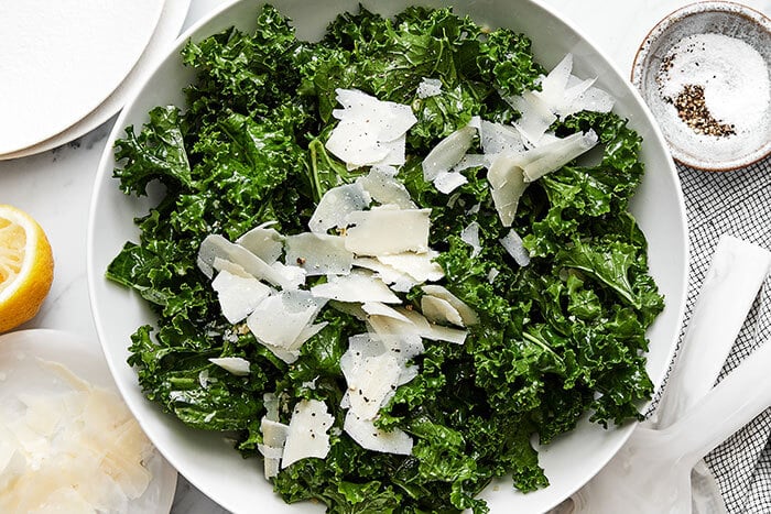 A simple kale salad in a bowl.