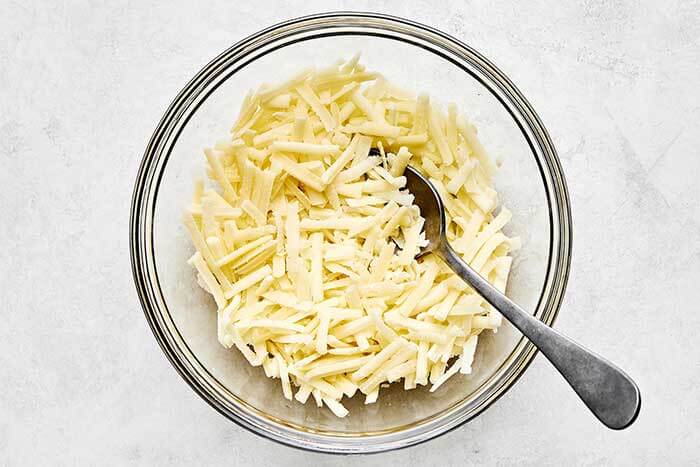 A cheese blend in a bowl.