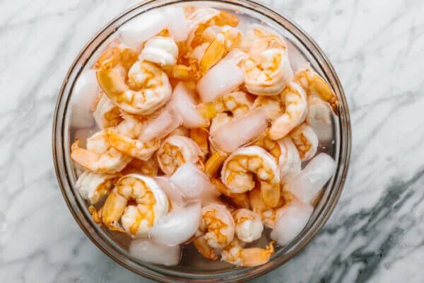 Shrimp in an ice water bath for shrimp salad
