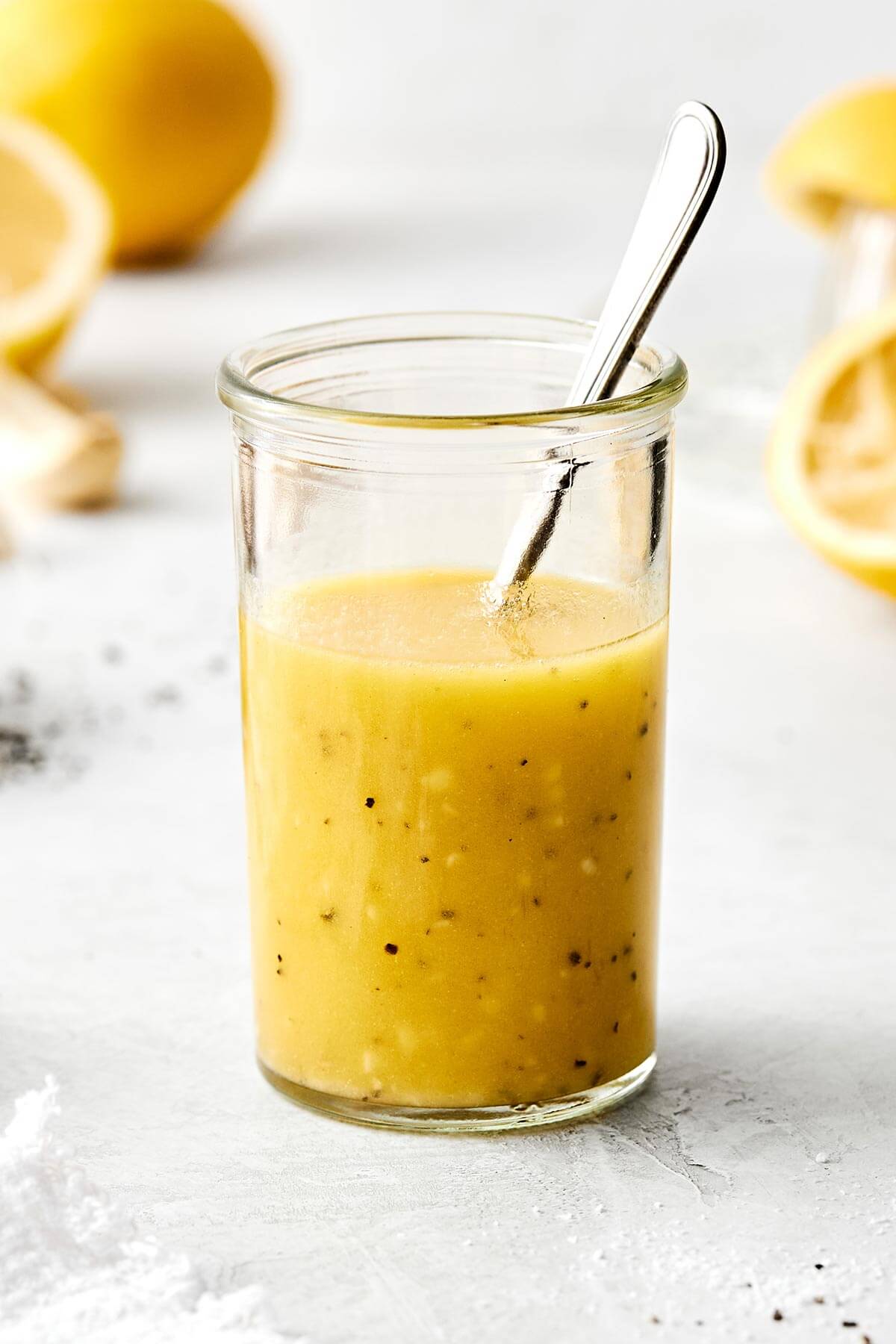 A jar of lemon vinaigrette.