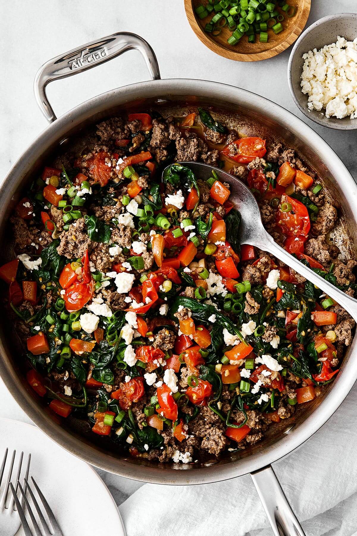 Mediterranean ground beef stir fry in a pan.