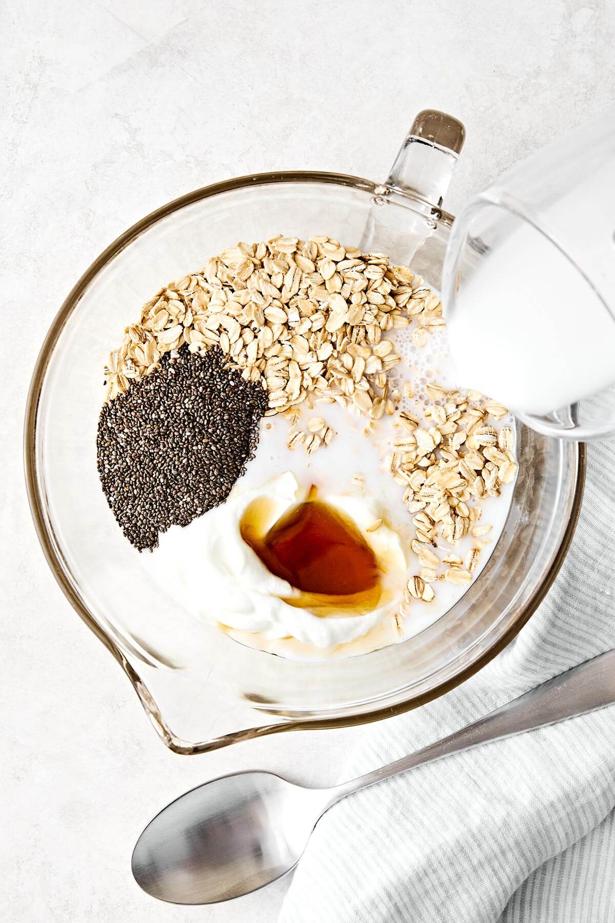 Making a large batch of overnight oats.