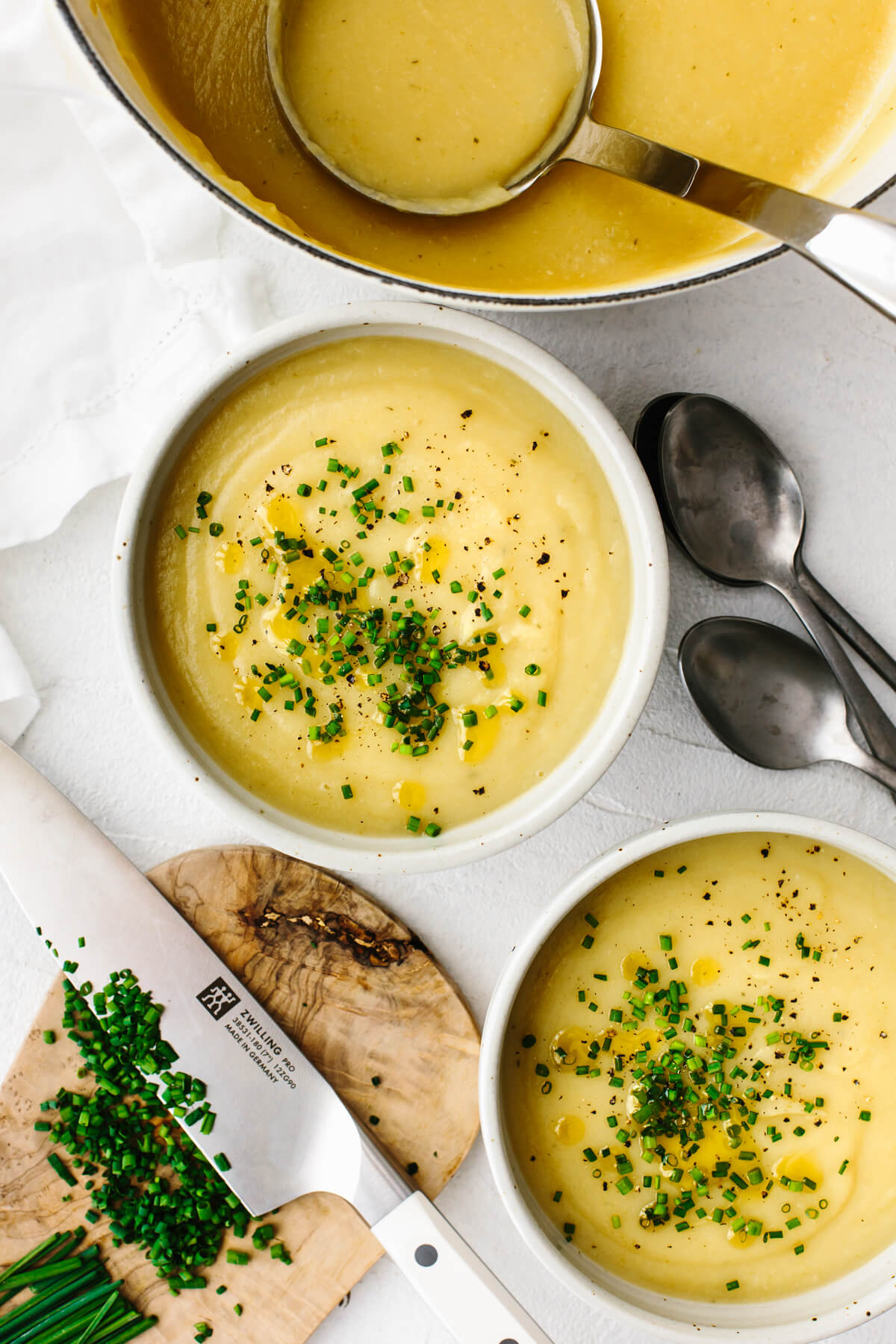 Potato Leek soup in bowls on a table