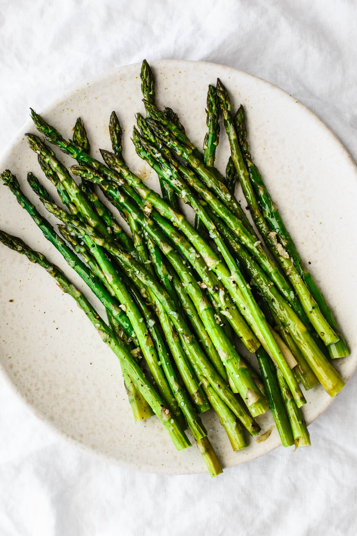 Roasted Asparagus on a white plate