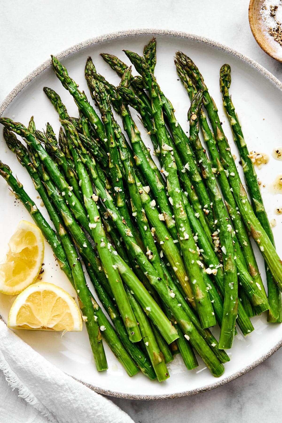A plate of roasted asparagus.