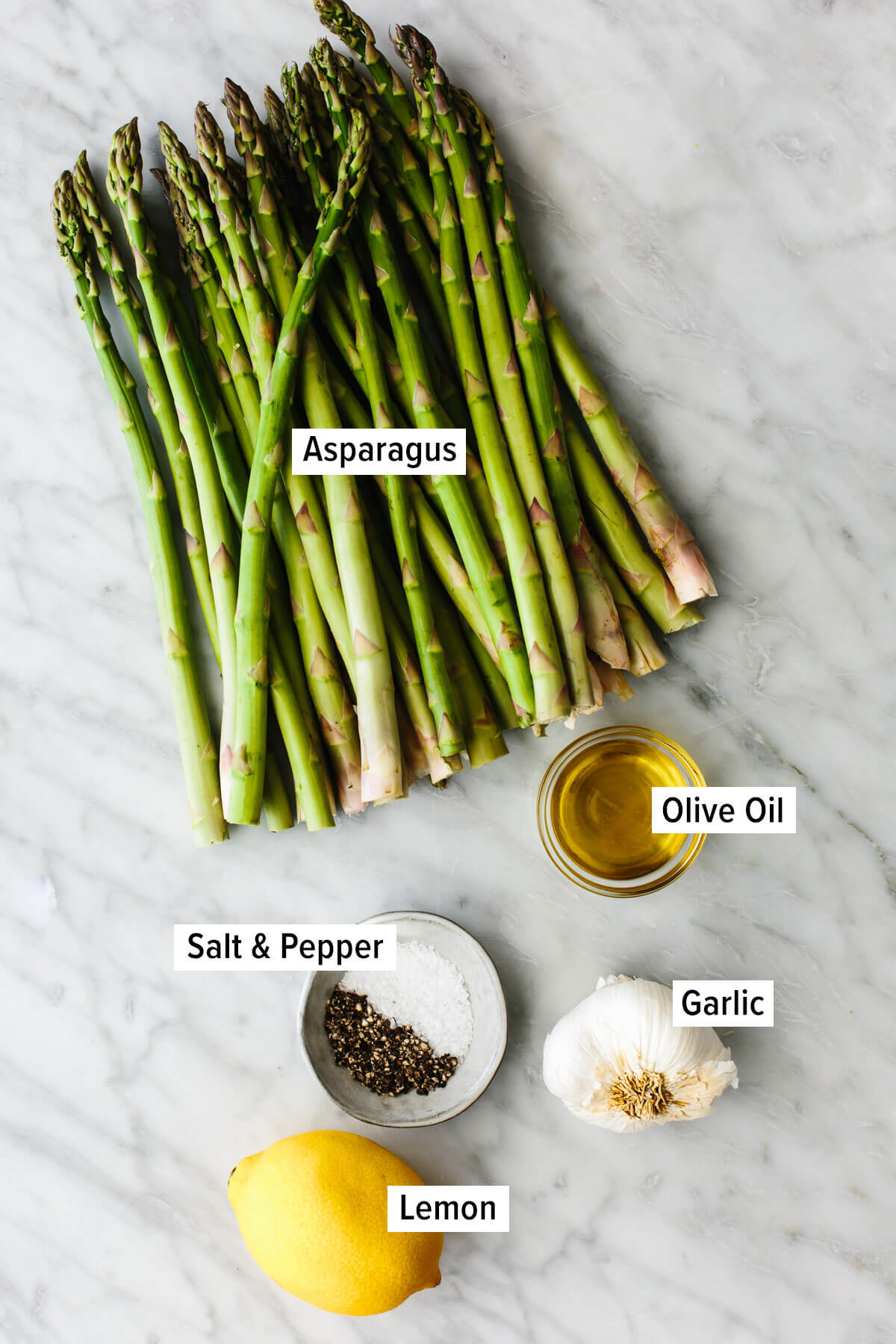 Ingredients for roasted asparagus on a table