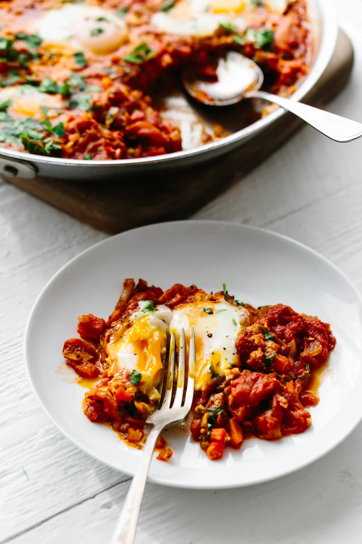 A single serving of shakshuka on a plate.