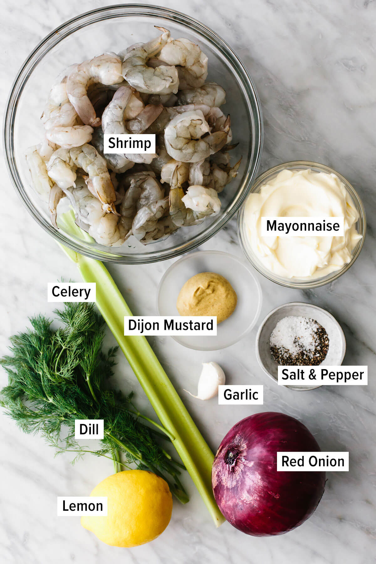 Ingredients for a shrimp salad on a table