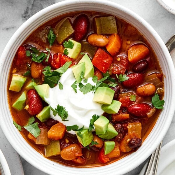 A white bowl of vegetarian chili.